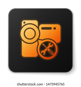 Orange glowing Video camera with screwdriver and wrench icon isolated on white background. Adjusting, service, setting, maintenance, repair, fixing. Black square button. Vector Illustration