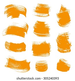 Orange gouache  smears set isolated on a white background