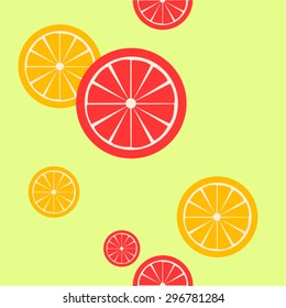 Orange and Grapefruit Slices on Light Green Background
