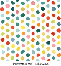 Orange, green, cyan, red, yellow, pink, goldenrod, mustard polka dot seamless pattern on white background. Round polygon texture. Abstract vector for prints, textile, wrapping, fabric, package, cover