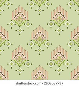 Orange and green geometric ethnic boho seamless pattern. Tribal pattern. Folk motif. Textile rapport. Navajo style. Vintage style, chevron, and rhombus. 