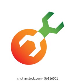 Orange and green wrench isolated on white