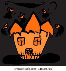 orange haunted house surrounded by a dark background. Halloween