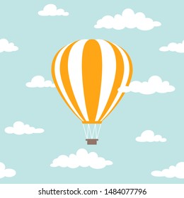 Orange hot air balloon flying in the powder blue sky with clouds. Flat cartoon design. Vector background.  Fantasy and freedom symbol.