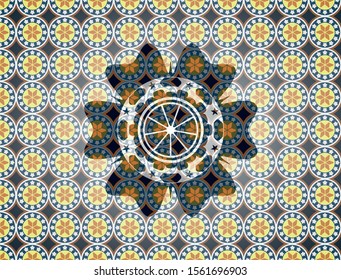 orange icon inside arabesque badge. arabic decoration.