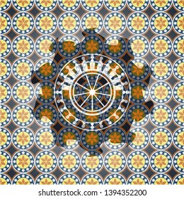 orange icon inside arabesque style emblem. arabic decoration.