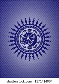 orange icon inside badge with denim background