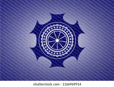 orange icon inside badge with jean texture