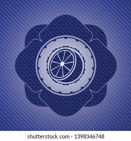 orange icon inside badge with jean texture