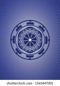 orange icon inside badge with jean texture