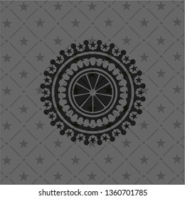 orange icon inside black emblem
