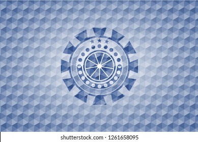 orange icon inside blue emblem or badge with abstract geometric pattern background.