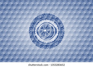 orange icon inside blue polygonal emblem.