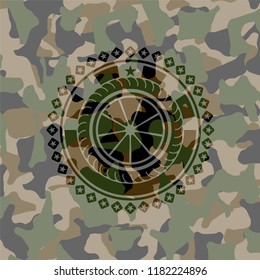 orange icon inside camouflage emblem