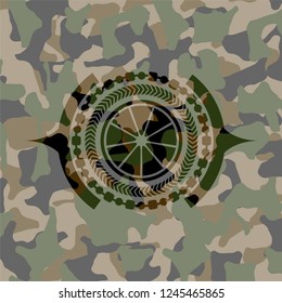 orange icon inside camouflage emblem