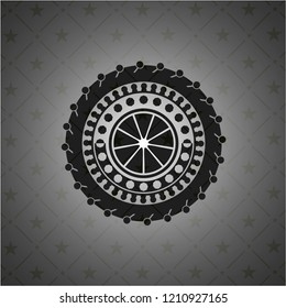 orange icon inside dark badge or emblem