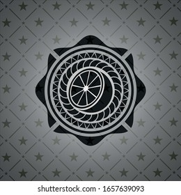 orange icon inside dark badge or emblem