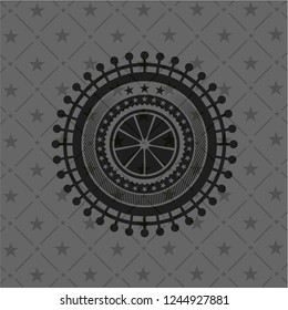 orange icon inside dark emblem. Retro
