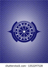 orange icon inside denim background