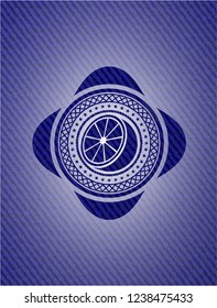orange icon inside emblem with denim high quality background