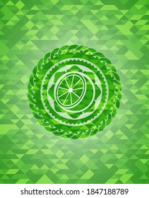 orange icon inside green emblem. Mosaic background. 