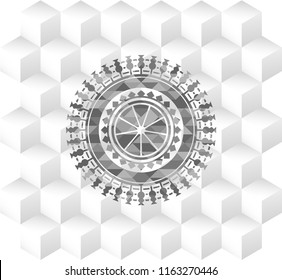 orange icon inside grey badge with geometric cube white background