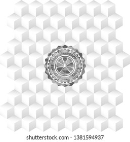 orange icon inside grey badge with geometric cube white background
