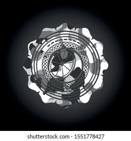 orange icon inside grey camo emblem