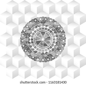orange icon inside grey emblem with geometric cube white background
