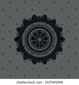 orange icon inside realistic black emblem