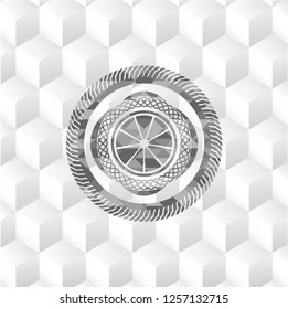 orange icon inside realistic grey emblem with cube white background
