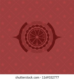 orange icon inside realistic red emblem