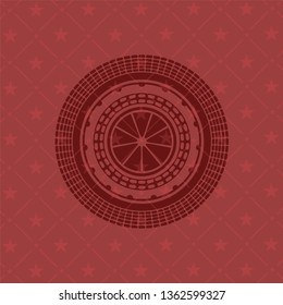orange icon inside realistic red emblem