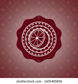 orange icon inside red emblem