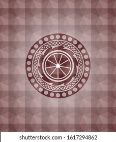 orange icon inside red seamless polygonal badge.