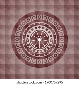 orange icon inside red seamless geometric badge.