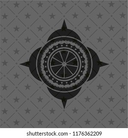 orange icon inside retro style black emblem