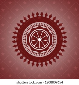 orange icon inside retro style red emblem