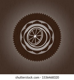 orange icon inside retro style wood emblem