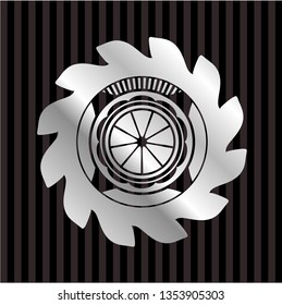 orange icon inside silver badge