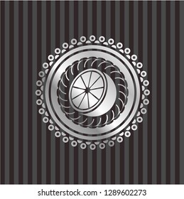 orange icon inside silver emblem
