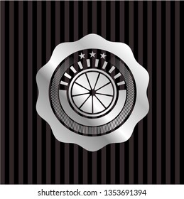 orange icon inside silver emblem