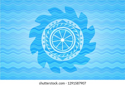 orange icon inside water concept emblem background.