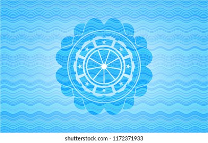 orange icon inside water wave emblem.