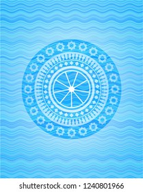 orange icon inside water wave representation badge background.