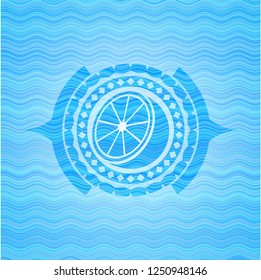 orange icon inside water wave emblem.