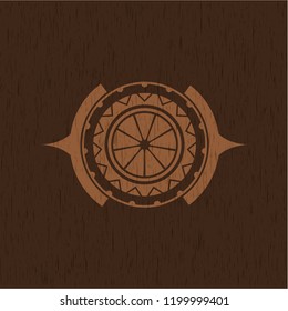 orange icon inside wooden emblem. Retro