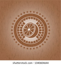 orange icon inside wooden emblem. Retro