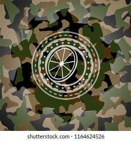 orange icon on camo pattern