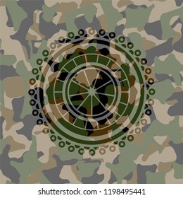 orange icon on camo pattern